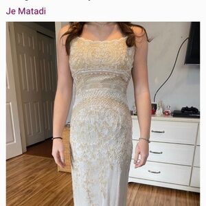 Long beaded ivory formal gown